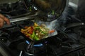 Preparing sizzling Mexican chicken fajitas