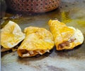 Preparing some fried quesadillas on the grill in the market Royalty Free Stock Photo