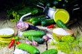 Preparing sour cucumbers in the kitchen on wood