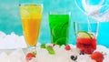 Preparing Summer Spritzer drinks with fresh fruit with sparkling mineral water.
