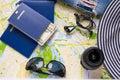 Preparing for summer weekend. Composition of accessories for beach spa resort. Passport, money, sun glasses, headphones Royalty Free Stock Photo