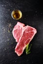 Preparing a t-bone steak for grilling