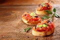 Preparing tasty Italian bruschetta Royalty Free Stock Photo