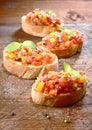 Preparing tasty Italian bruschetta Royalty Free Stock Photo