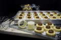 Preparing tasty pineapple tarts in a dark kitchen