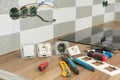 Preparing to install an electrical outlet. Closeup of professional electrician tools and electrical outlets. Renovation and