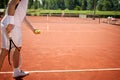 Preparing to serve tennis ball