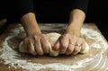 Woman hands kneading fresh dough for making bread or pizza. Royalty Free Stock Photo