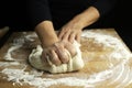 Woman hands kneading fresh dough for making bread or pizza. Royalty Free Stock Photo