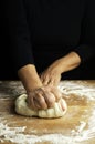 Woman hands kneading fresh dough for making bread or pizza. Royalty Free Stock Photo