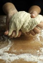 Woman hands kneading fresh dough for making bread or pizza. Royalty Free Stock Photo