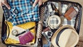 Preparing travel suitcase high angle view Royalty Free Stock Photo