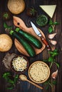 Preparing veggies cutlets or patties for burgers. Zucchini quinoa veggie burger with pesto sauce and sprouts. Top view, overhead