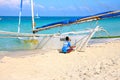 Prepping the sailing boat for a trip around the island