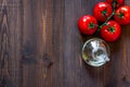 Prepring for cooking dinner. Tomato on wooden table background top view copyspace