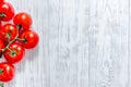 Prepring for cooking dinner. Tomato on wooden table background top view copyspace