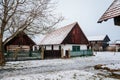 Prerov nad Labem, Czech Republic, 5 December 2021: Traditional village wooden farm house in winter, historic country-style