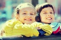 Preschool aged girls posing in urban street