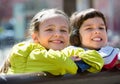 Preschool aged girls posing in urban street