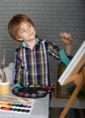 Preschool boy learns to think creatively