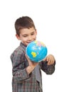 Preschool boy playing with a globe Royalty Free Stock Photo
