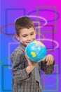 Preschool boy playing with a globe Royalty Free Stock Photo