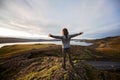 Preschool boy, standing on top of hill in Geothermal area in Reykjanesfolkvangur, enjoying the view of a splendid nature in