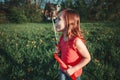 Preschool Caucasian girl blowing soap bubbles in park on summer day. Child having fun outdoors. Authentic happy childhood magic Royalty Free Stock Photo