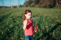 Preschool Caucasian girl blowing soap bubbles in park on summer day. Child having fun outdoors. Authentic happy childhood magic Royalty Free Stock Photo