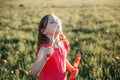 Preschool Caucasian girl blowing soap bubbles in park on summer day. Child having fun outdoors. Authentic happy childhood magic Royalty Free Stock Photo