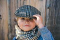 Preschool child. Boy face. Elegant child. Autumn weather. People, adorable kid, funny portrait. Cap, hat and scarf.