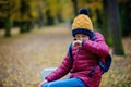 Preschool child, boy, sneezing in park, flu season Royalty Free Stock Photo