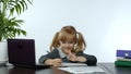 Preschool child girl distance online learning at home. Kid studying using digital laptop computer Royalty Free Stock Photo