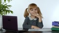 Preschool child girl distance online learning at home. Kid studying using digital laptop computer Royalty Free Stock Photo