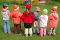 Preschool children playing outside