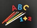 Preschool Education, Colourful Letters, Pencils and Numbers on a Blackboard