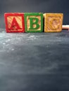 Preschool Education shown with preschool blocks on a blackboard