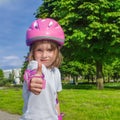 Preschool girl in protective sportwear