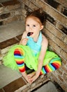 Preschool girl with tutu and candy sucker