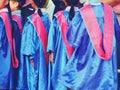 Preschool kid wearing graduation dress close up