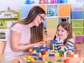 Preschool Teacher and Child Enjoying and Smiling Royalty Free Stock Photo