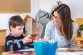 Preschool teacher with child at Kindergarten - Creative Art Class Royalty Free Stock Photo