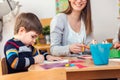 Preschool Teacher with Children at Kindergarten - Creative Art Class Royalty Free Stock Photo