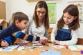 Preschool Teacher with Children at Kindergarten - Creative Art Class Royalty Free Stock Photo