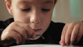 Child plays with perler beads. fine motor development