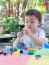 Preschooler child playing creative colorful building blocks toy at home Royalty Free Stock Photo