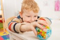 Preschooler with globe in the classroom Royalty Free Stock Photo