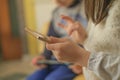 Preschooler Kids playing with portable videogames console,tech kids addiction