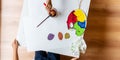 Preschoolers painting with colors Royalty Free Stock Photo