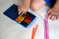 Preschoolers are practicing coloring on white paper